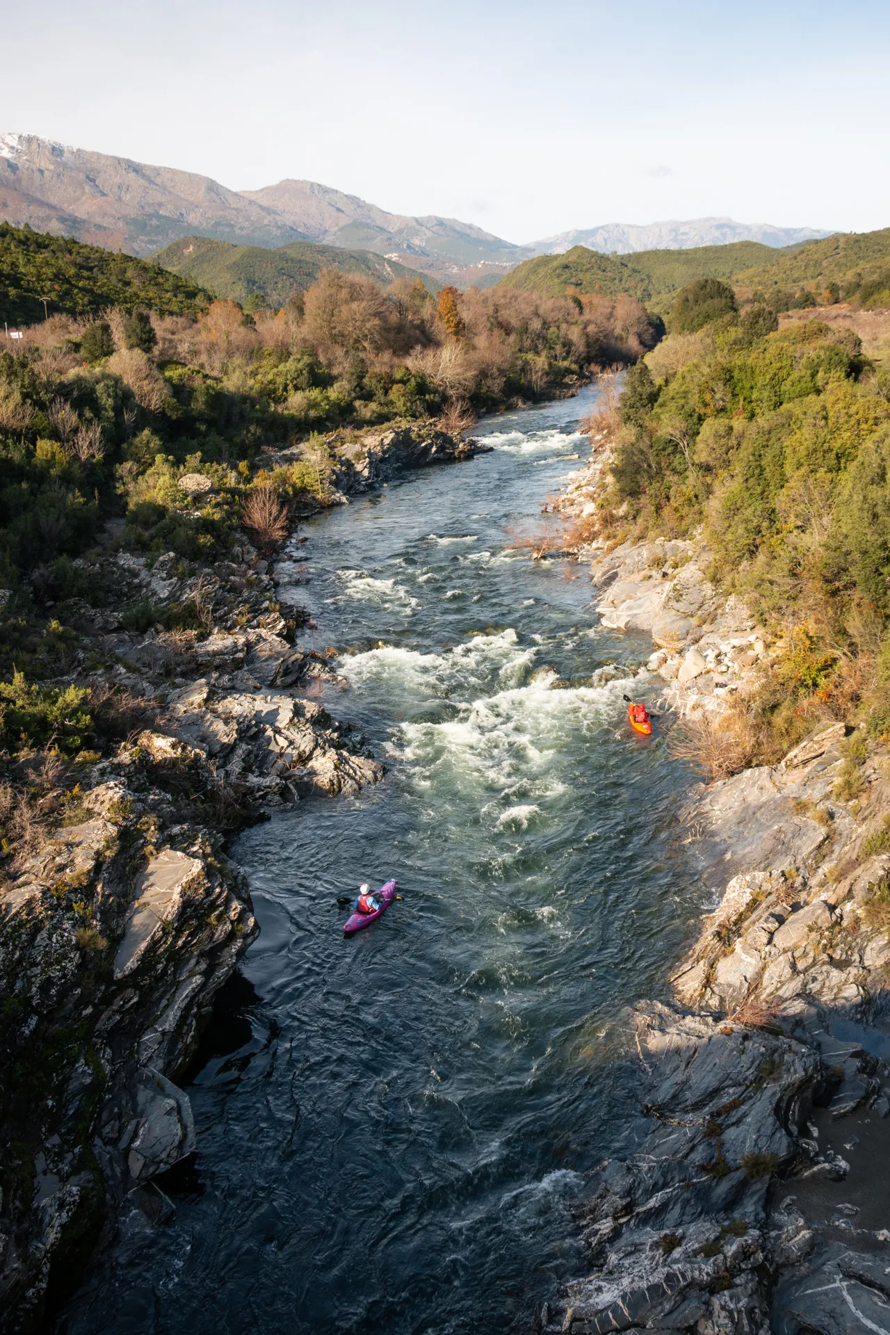 Sunlit river section near Ernella Camping